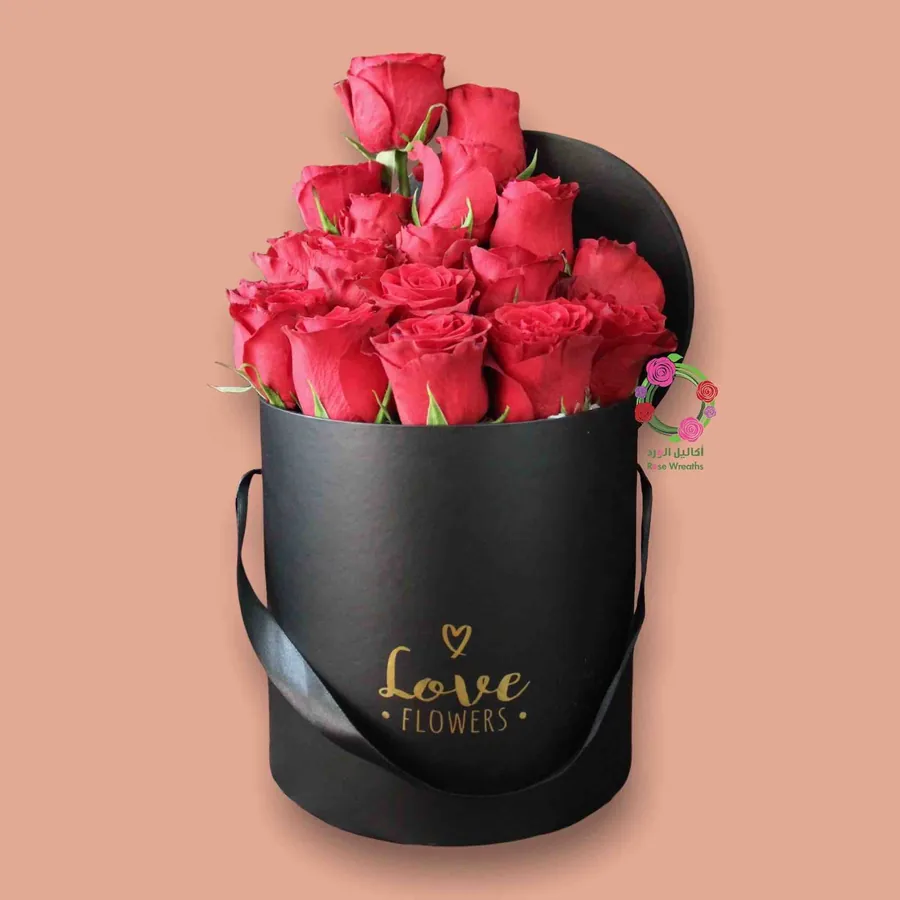 Red roses in a black Love Flowers box
